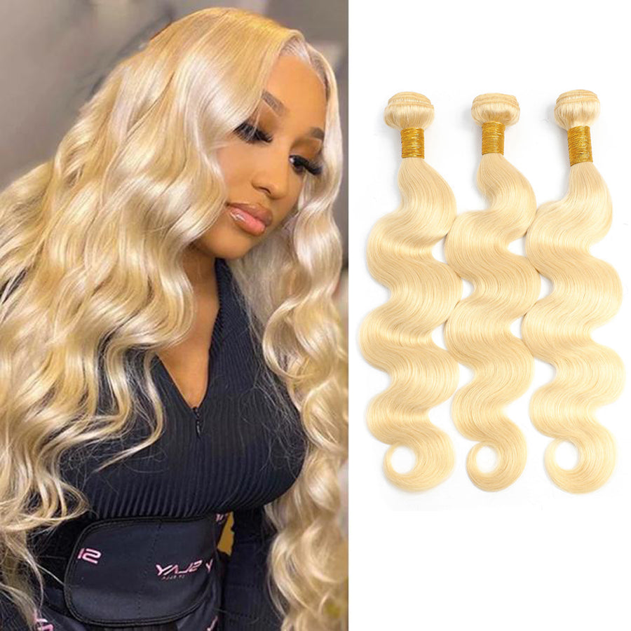 Blonde human hair weft bundles