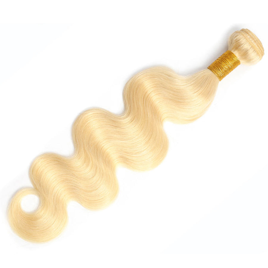 Wavy blonde human hair weave